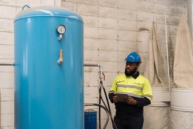 factory-male-engineer-worker-working-260nw-2341294045